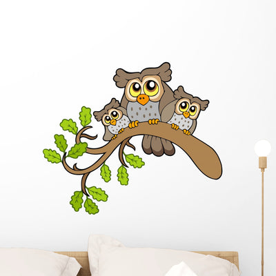 Three Cute Owls Branch Wall Decal shown on a wall