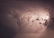 Lightning arcs between clouds during a storm Wall Mural