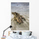 The tide coming in and flowing around a sunken piece of driftwood Wall Mural