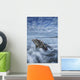 The tide coming in and flowing around a sunken piece of driftwood Wall Mural