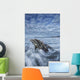 The tide coming in and flowing around a sunken piece of driftwood Wall Mural