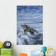 The tide coming in and flowing around a sunken piece of driftwood Wall Mural