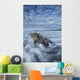 The tide coming in and flowing around a sunken piece of driftwood Wall Mural