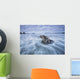 The tide coming in and flowing around a sunken piece of driftwood Wall Mural