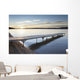 A dock in lake superior at sunset;Thunder bay, ontario, canada Wall Mural