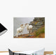 Dall's sheep rams standing by rock outcrop Wall Mural