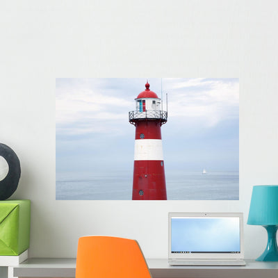 Red and White Lighthouse Wall Mural shown on a wall