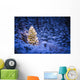 Lit Christmas Tree In Snow Covered Forest Of Spruce Trees Wall Mural