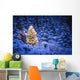 Lit Christmas Tree In Snow Covered Forest Of Spruce Trees Wall Mural