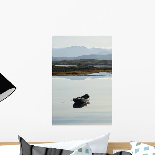 A rowboat sits Wall Mural