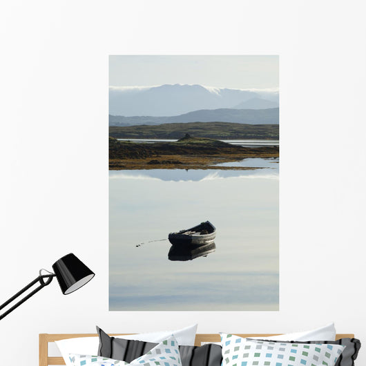 A rowboat sits Wall Mural