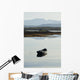 A rowboat sits Wall Mural