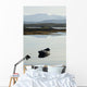 A rowboat sits Wall Mural