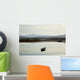 A rowboat sits Wall Mural