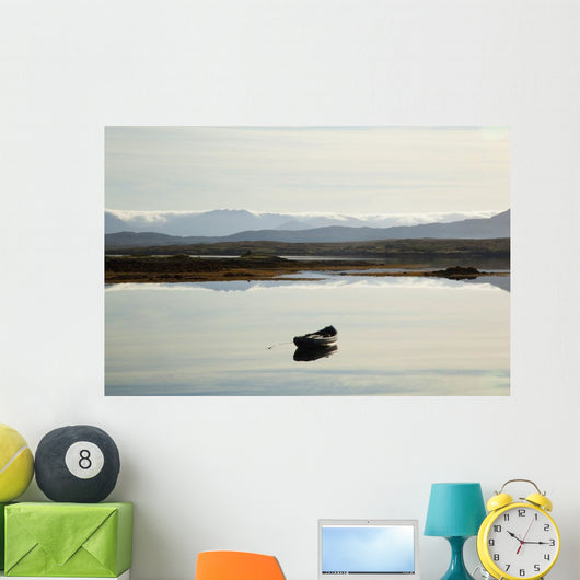 A rowboat sits Wall Mural