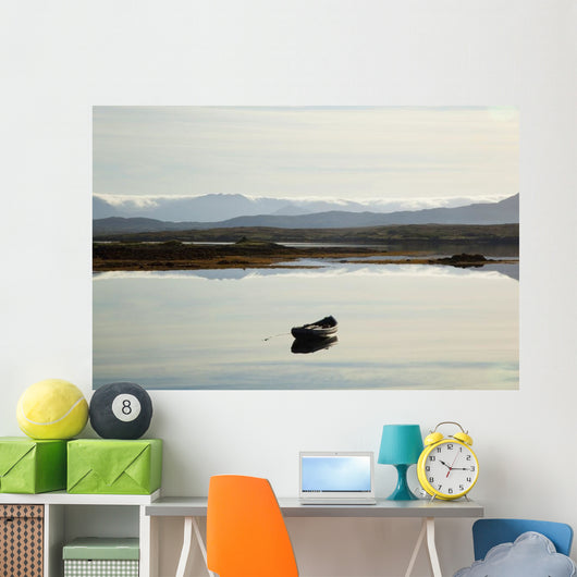 A rowboat sits Wall Mural