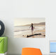 Spain, Andalusia, Cadiz, Costa de la Luz, Surfer on beach Wall Mural