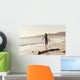Spain, Andalusia, Cadiz, Costa de la Luz, Surfer on beach Wall Mural