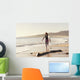 Spain, Andalusia, Cadiz, Costa de la Luz, Surfer on beach Wall Mural