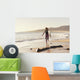 Spain, Andalusia, Cadiz, Costa de la Luz, Surfer on beach Wall Mural