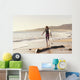 Spain, Andalusia, Cadiz, Costa de la Luz, Surfer on beach Wall Mural
