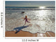 Woman in wetsuit running on beach Wall Mural