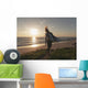 Spain, Andalusia, Cadiz, Costa de la Luz, Surfer on beach Wall Mural