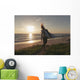 Spain, Andalusia, Cadiz, Costa de la Luz, Surfer on beach Wall Mural