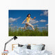 Girl Jumping Running against Wall Mural