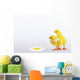 Two yellow baby chicks looking at fried egg;British columbia canada Wall Mural