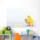 Two yellow baby chicks looking at fried egg;British columbia canada Wall Mural