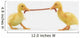 Two baby ducklings fighting over a worm;British columbia canada Wall Mural