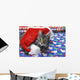 Grey tabby cat with santa claus hat lying Wall Mural