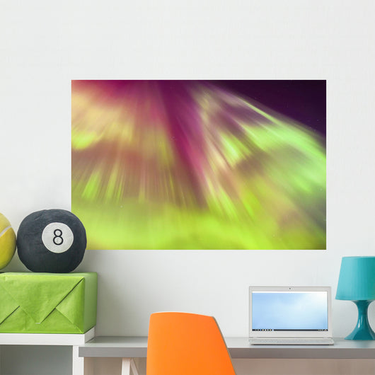 A Green And Purple Northern Lights Corona Wall Mural