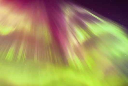 A Green And Purple Northern Lights Corona Wall Mural