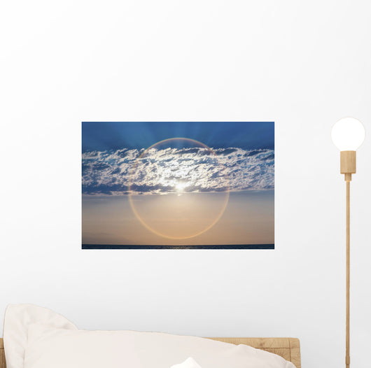 The setting sun creates a sundog;Puerta vallarta mexico Wall Mural