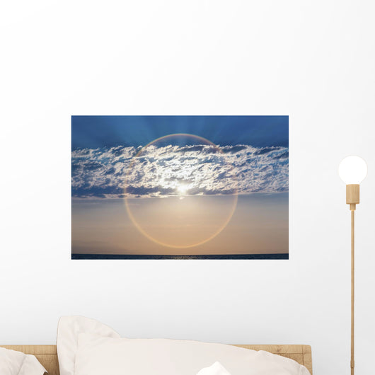The setting sun creates a sundog;Puerta vallarta mexico Wall Mural