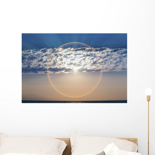The setting sun creates a sundog;Puerta vallarta mexico Wall Mural