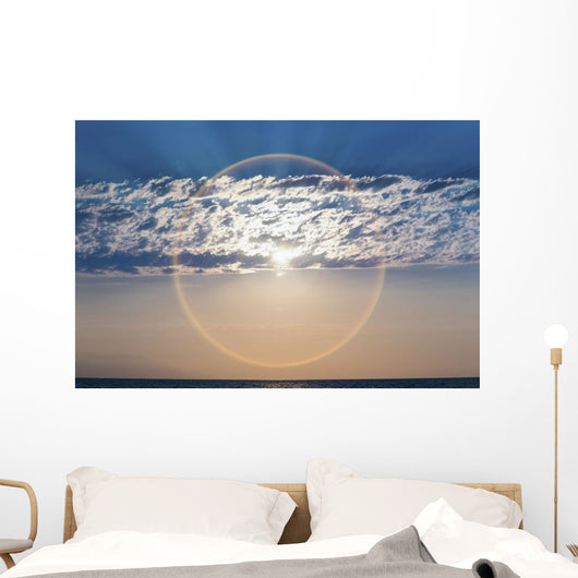 The setting sun creates a sundog;Puerta vallarta mexico Wall Mural