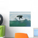 Spain, Andalusia, Cadiz, Male Surfer Mid Air In Large Splashing Wave Wall Mural
