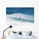 Paddleboarding In The Waves Along The Coast Of Cape Trafalgar Wall Mural