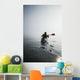 A Sea Kayaker Paddles Into Thick Fog On On A Calm Morning Wall Mural