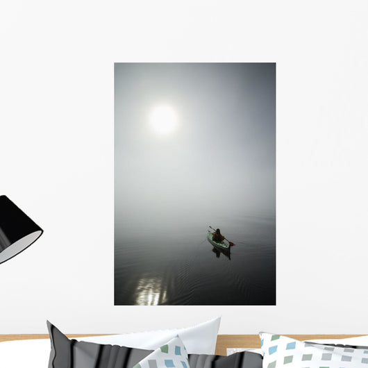 A Sea Kayaker Paddles Into Thick Fog On On A Calm Morning Wall Mural