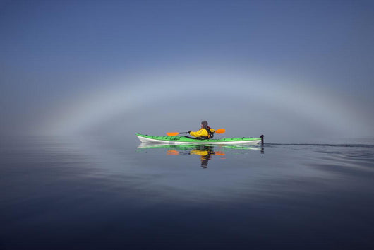 A Sea Kayaker Paddles Wall Mural