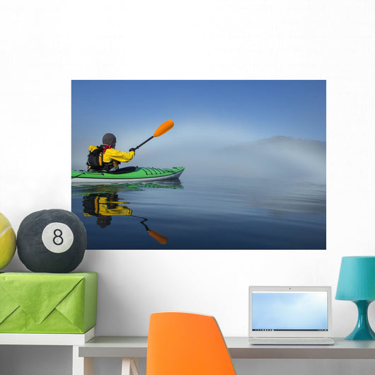 A Sea Kayaker Paddles Wall Mural