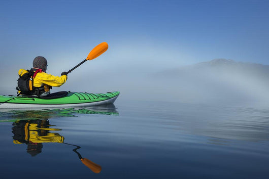 A Sea Kayaker Paddles Wall Mural
