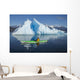 A Sea Kayaker Paddles Beside An Iceberg Wall Mural