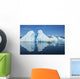 A Sea Kayaker Paddles Beside An Iceberg Wall Mural