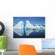 A Sea Kayaker Paddles Beside An Iceberg Wall Mural