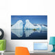 A Sea Kayaker Paddles Beside An Iceberg Wall Mural